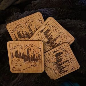 NEW Set of 4 matching wooden mountain scene coasters from a Marlboro promotion